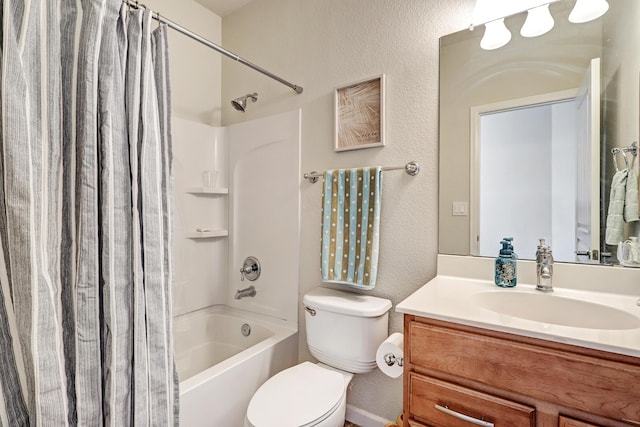 15 Los Miradores Dr NE, Rio Rancho, NM 87124 - bathroom featuring shower / tub combo, toilet, vanity, and a textured wall