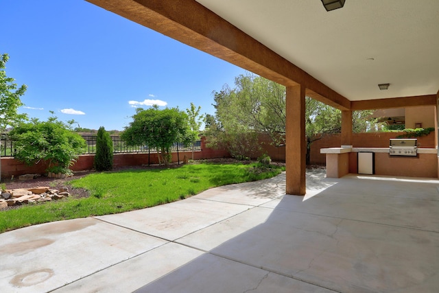 15 Los Miradores Dr NE, Rio Rancho, NM 87124 - view of patio with an outdoor kitchen and grilling area