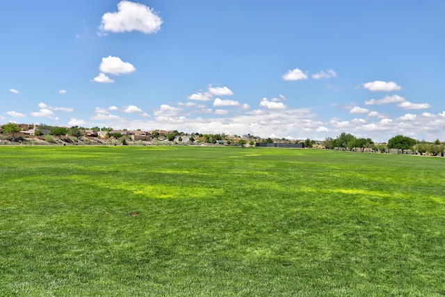 15 Los Miradores Dr NE, Rio Rancho, NM 87124 - view of home's community featuring a lawn