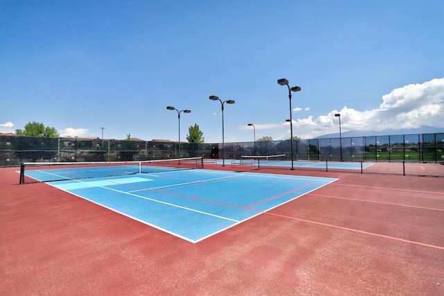 15 Los Miradores Dr NE, Rio Rancho, NM 87124 - view of tennis court featuring fence