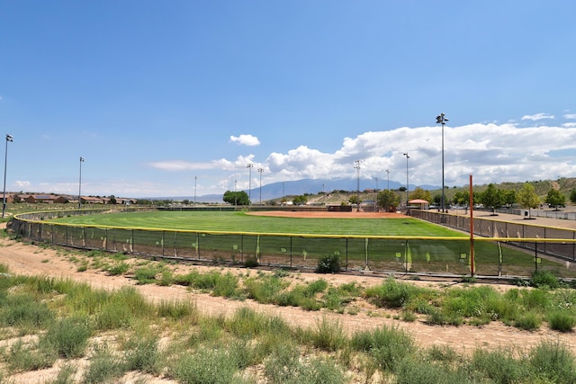 15 Los Miradores Dr NE, Rio Rancho, NM 87124 - surrounding community with fence, a view of countryside, and a mountain view