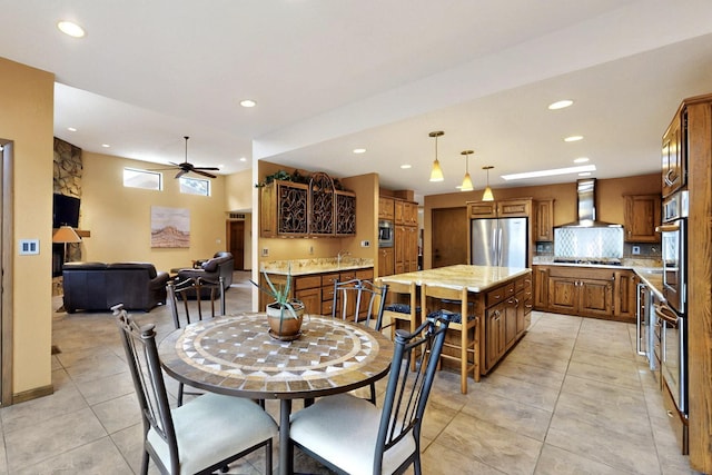 13108 Della Longa Ln NE, Albuquerque, NM 87111 - dining area featuring light tile patterned floors, recessed lighting, and a ceiling fan