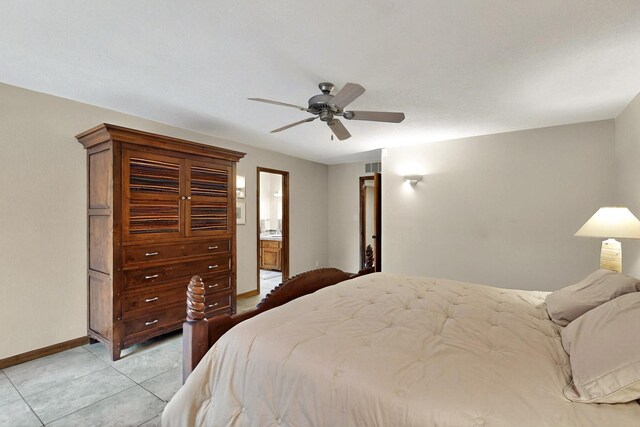 13108 Della Longa Ln NE, Albuquerque, NM 87111 - bedroom featuring baseboards, a ceiling fan, ensuite bath, and light tile patterned flooring