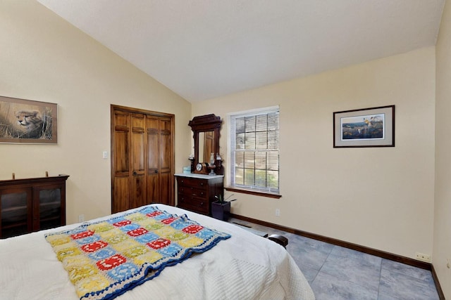 13108 Della Longa Ln NE, Albuquerque, NM 87111 - bedroom with baseboards, lofted ceiling, and a closet