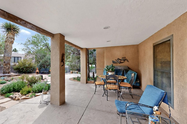 13108 Della Longa Ln NE, Albuquerque, NM 87111 - view of patio featuring outdoor dining area