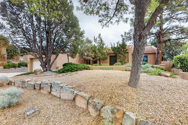 13108 Della Longa Ln NE, Albuquerque, NM 87111 - adobe home featuring stucco siding and a tiled roof