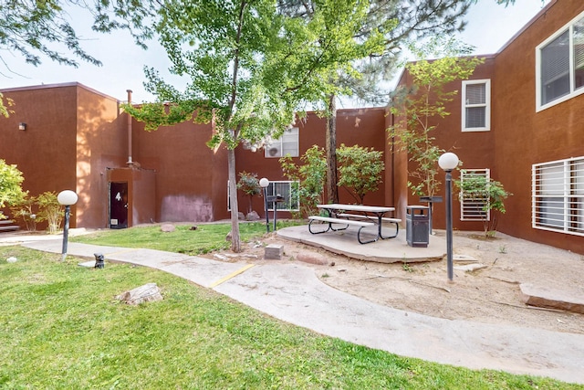 2800 Vail Ave SE Unit D113, Albuquerque, NM 87106 - view of community featuring a lawn