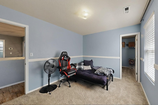 7720 Red Finch Ct NW, Albuquerque, NM 87114 - sitting room with plenty of natural light, carpet flooring, and baseboards