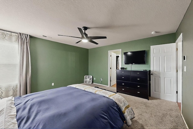 7720 Red Finch Ct NW, Albuquerque, NM 87114 - bedroom with carpet flooring, a textured ceiling, ceiling fan, and baseboards