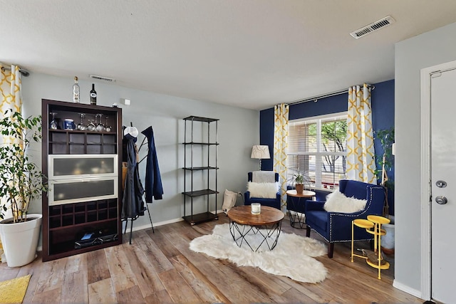7720 Red Finch Ct NW, Albuquerque, NM 87114 - living area featuring wood finished floors and baseboards