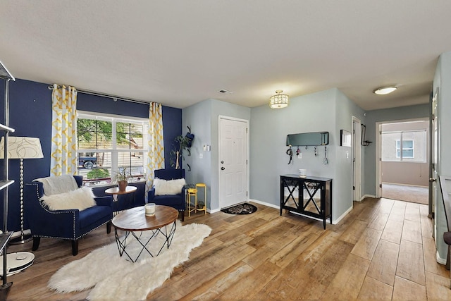 7720 Red Finch Ct NW, Albuquerque, NM 87114 - living area featuring light wood finished floors and baseboards