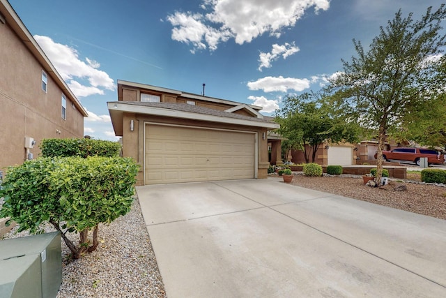 7720 Red Finch Ct NW, Albuquerque, NM 87114 - view of front of property with stucco siding
