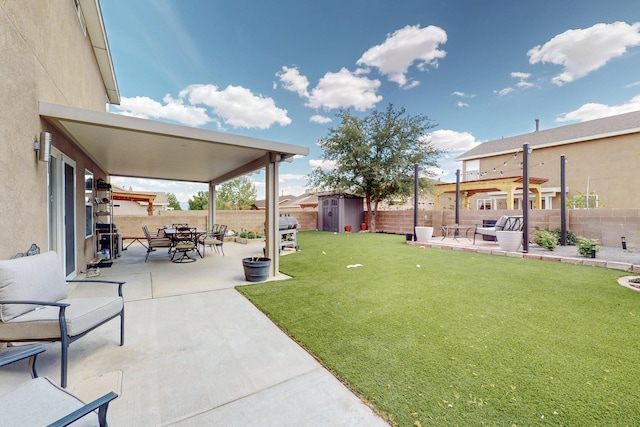 7720 Red Finch Ct NW, Albuquerque, NM 87114 - view of yard with a shed, a patio, an outdoor structure, and outdoor dining area