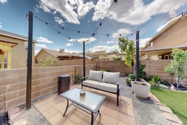 7720 Red Finch Ct NW, Albuquerque, NM 87114 - view of patio with a fenced backyard and outdoor lounge area