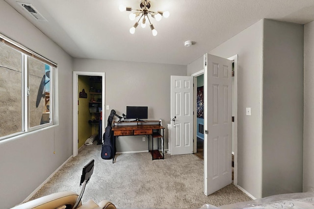 7720 Red Finch Ct NW, Albuquerque, NM 87114 - office featuring a chandelier, light colored carpet, and baseboards