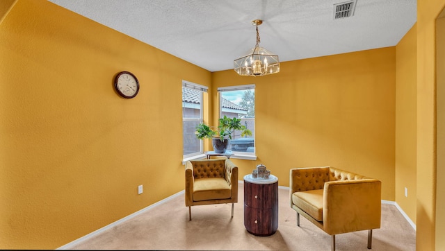 4212 Caprock Rd NW, Albuquerque, NM 87114 - living area featuring a chandelier, carpet floors, baseboards, and a textured wall