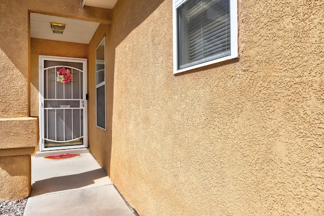 6605 Country Knoll Ct NW, Albuquerque, NM 87114 - view of exterior entry with stucco siding