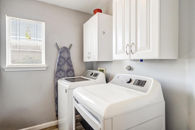 6605 Country Knoll Ct NW, Albuquerque, NM 87114 - laundry room featuring washer and dryer, cabinet space, and baseboards