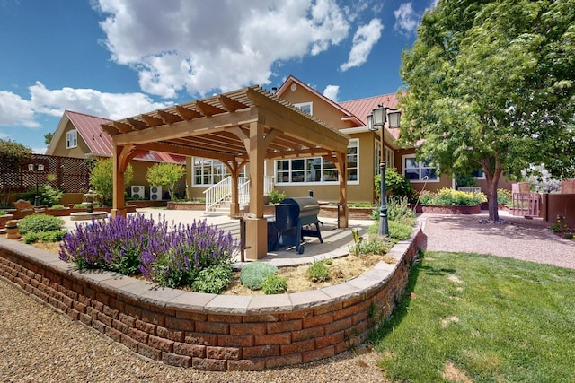 view of patio / terrace with a pergola and area for grilling