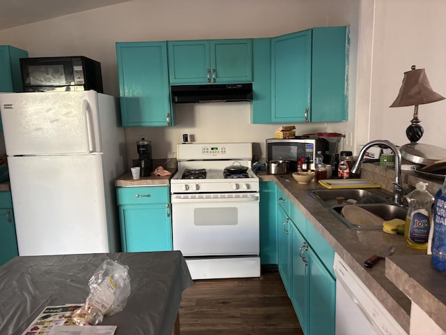 1816 Isleta Blvd SW, Albuquerque, NM 87105 - kitchen featuring white appliances, under cabinet range hood, and dark wood finished floors
