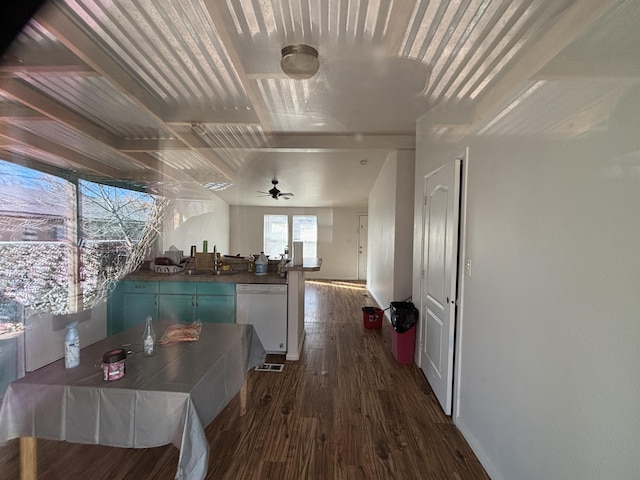 1816 Isleta Blvd SW, Albuquerque, NM 87105 - kitchen with white dishwasher, dark wood-style floors, dark countertops, and a ceiling fan