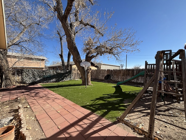 1816 Isleta Blvd SW, Albuquerque, NM 87105 - view of yard featuring a playground