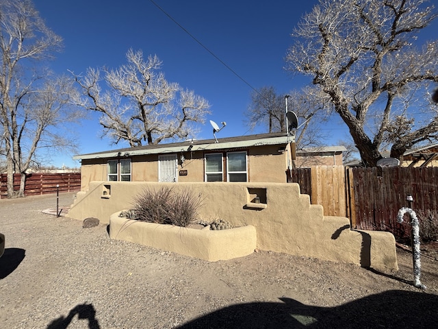 1816 Isleta Blvd SW, Albuquerque, NM 87105 - view of front of house featuring stucco siding
