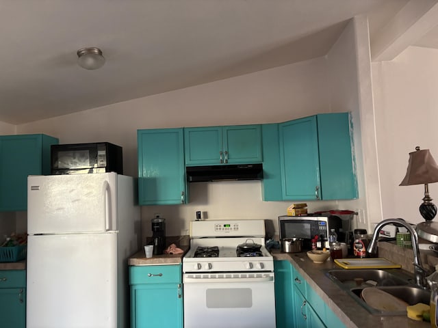1816 Isleta Blvd SW, Albuquerque, NM 87105 - kitchen featuring white appliances and under cabinet range hood
