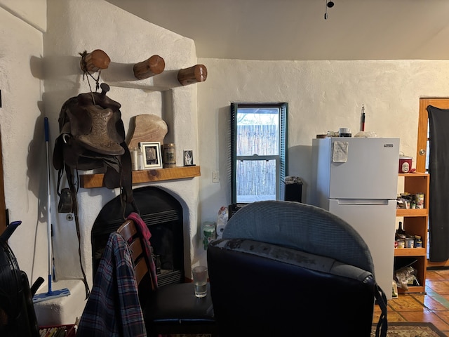 1816 Isleta Blvd SW, Albuquerque, NM 87105 - living area with a textured wall and a fireplace
