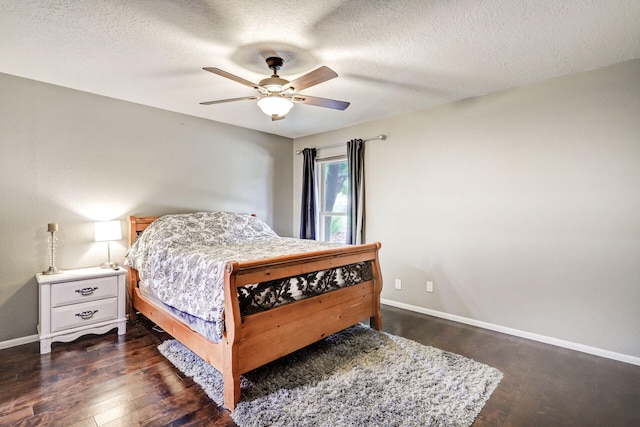 6400 Torreon Dr NE, Albuquerque, NM 87109 - bedroom featuring baseboards, wood finished floors, ceiling fan, and a textured ceiling