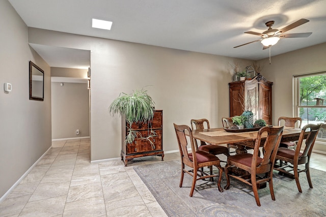 6400 Torreon Dr NE, Albuquerque, NM 87109 - dining room with ceiling fan and baseboards