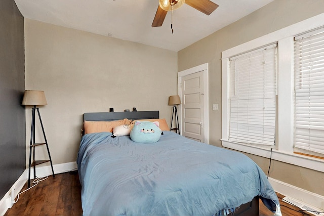 608 Coal Ave SE, Albuquerque, NM 87102 - bedroom featuring wood finished floors, baseboards, and ceiling fan