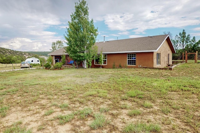 5 Francisco Rd, Cedar Crest, NM 87008 - rear view of house featuring a yard and stucco siding