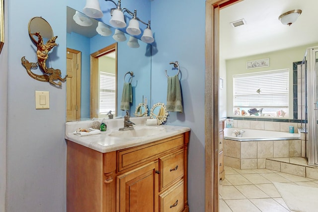 5 Francisco Rd, Cedar Crest, NM 87008 - full bath with healthy amount of natural light, vanity, a garden tub, and tile patterned floors