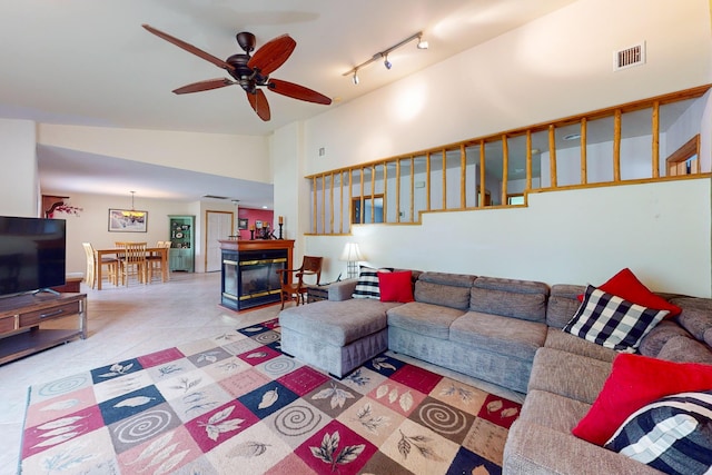 5 Francisco Rd, Cedar Crest, NM 87008 - tiled living room with ceiling fan, high vaulted ceiling, and rail lighting