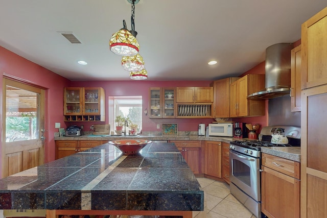 5 Francisco Rd, Cedar Crest, NM 87008 - kitchen featuring gas range, wall chimney exhaust hood, a center island, healthy amount of natural light, and recessed lighting