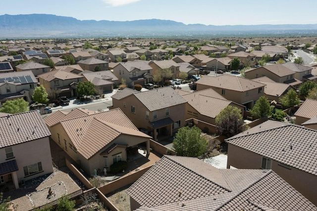 9631 Iron Rock Dr NW, Albuquerque, NM 87114 - aerial view of residential area featuring a mountain backdrop
