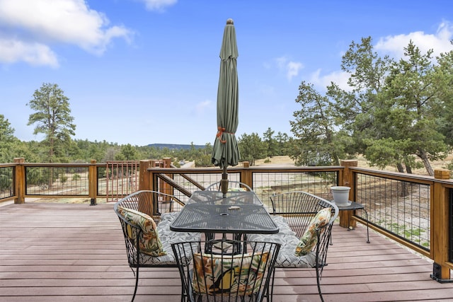 160 Black Bear Rd, Ramah, NM 87321 - wooden terrace with outdoor dining area