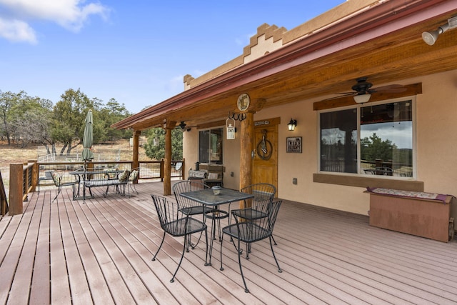160 Black Bear Rd, Ramah, NM 87321 - wooden terrace with outdoor dining area and ceiling fan
