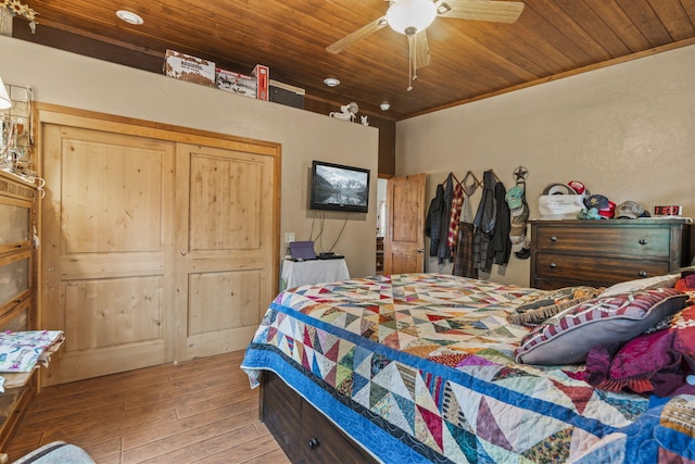 160 Black Bear Rd, Ramah, NM 87321 - bedroom with hardwood / wood-style flooring, wood ceiling, ceiling fan, and ornamental molding