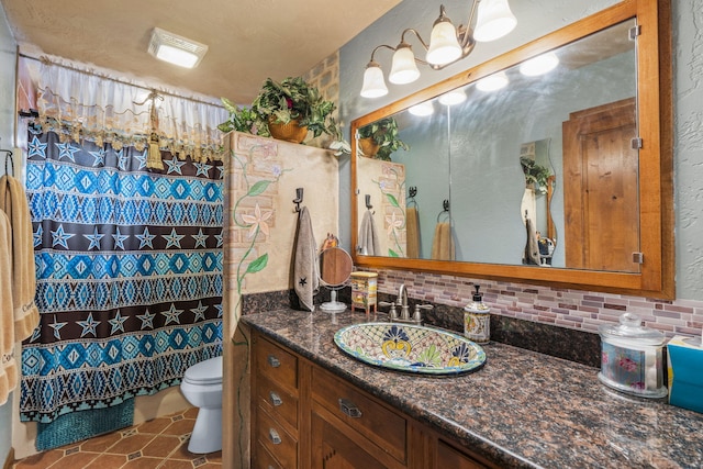 160 Black Bear Rd, Ramah, NM 87321 - bathroom with vanity, tasteful backsplash, and tile patterned flooring