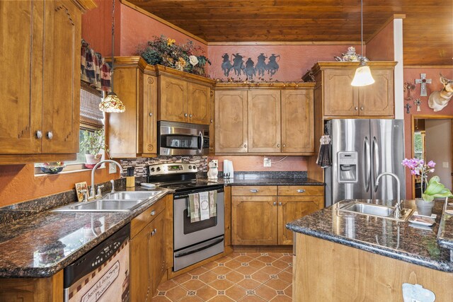 160 Black Bear Rd, Ramah, NM 87321 - kitchen with appliances with stainless steel finishes, wooden ceiling, brown cabinetry, pendant lighting, and backsplash