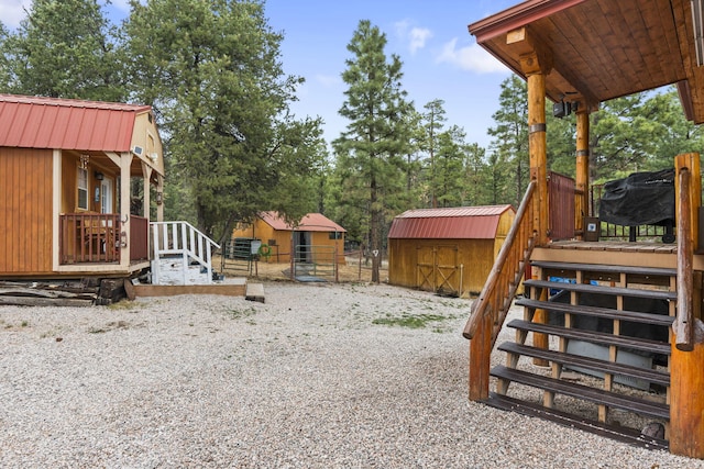 160 Black Bear Rd, Ramah, NM 87321 - view of yard with stairway and a shed
