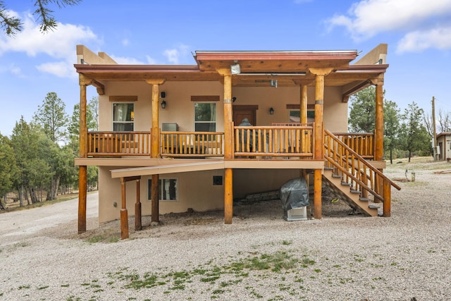 160 Black Bear Rd, Ramah, NM 87321 - rear view of property featuring stucco siding