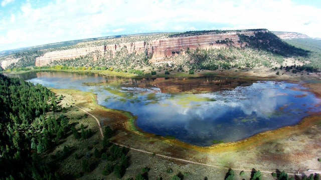 160 Black Bear Rd, Ramah, NM 87321 - aerial view of property and surrounding area with a water and mountain view