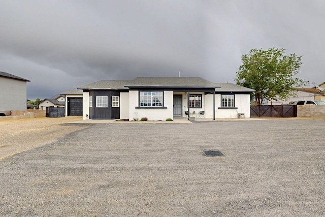 404 Pecos Loop SE, Rio Rancho, NM 87124 - view of front facade featuring a garage