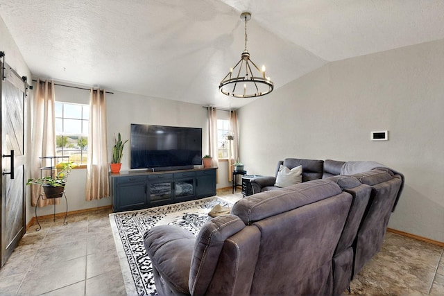 404 Pecos Loop SE, Rio Rancho, NM 87124 - living area featuring a chandelier, healthy amount of natural light, baseboards, and vaulted ceiling