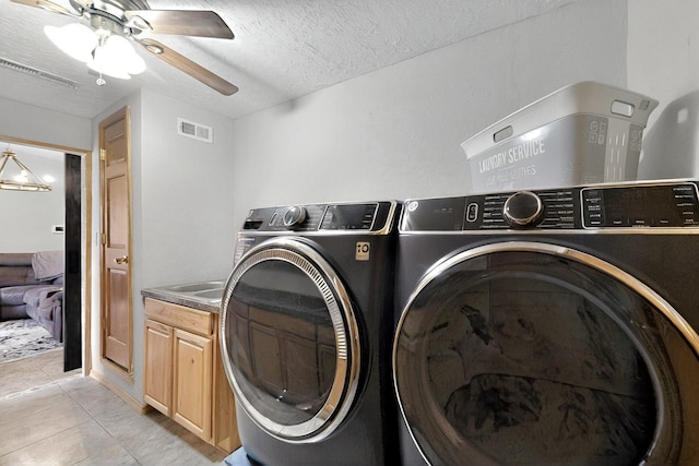 404 Pecos Loop SE, Rio Rancho, NM 87124 - laundry room with independent washer and dryer, cabinet space, a ceiling fan, light tile patterned floors, and a textured ceiling