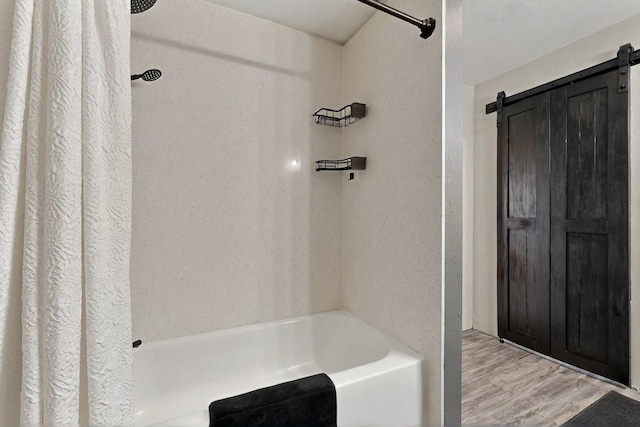 404 Pecos Loop SE, Rio Rancho, NM 87124 - bathroom with wood finished floors and shower / tub combo with curtain