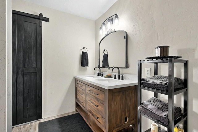 404 Pecos Loop SE, Rio Rancho, NM 87124 - full bathroom with double vanity and wood finished floors